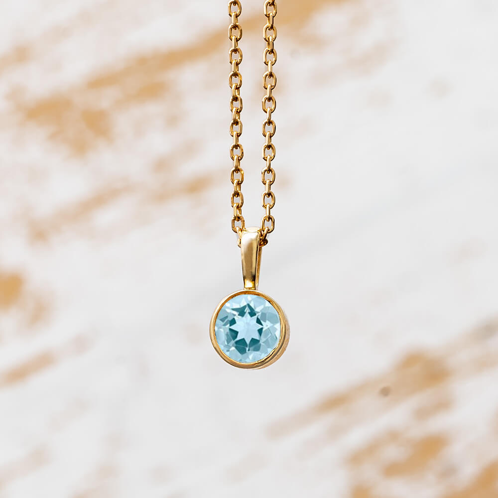 14k Yellow Gold Birthstone Necklace with Round Cut Aquamarine