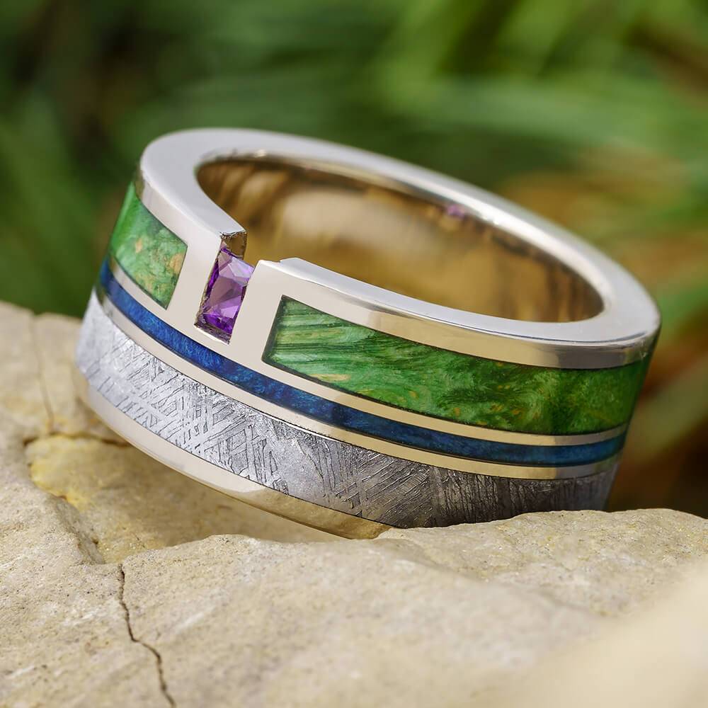 Men's wedding ring with meteorite and colored woods on stone