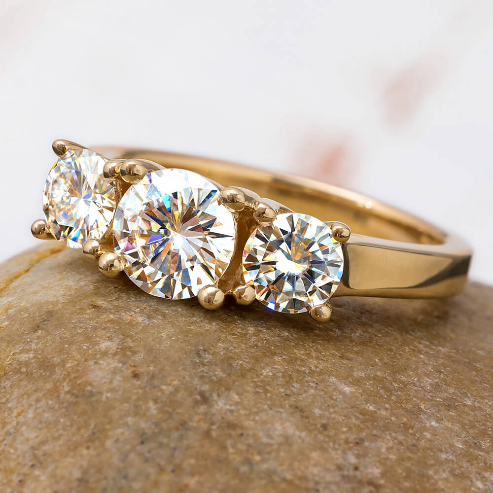 Three Stone Engagement Ring in Yellow Gold