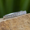 Diamond anniversary band with milgrain edges on stone