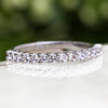 Diamond anniversary band with U-shaped prong setting