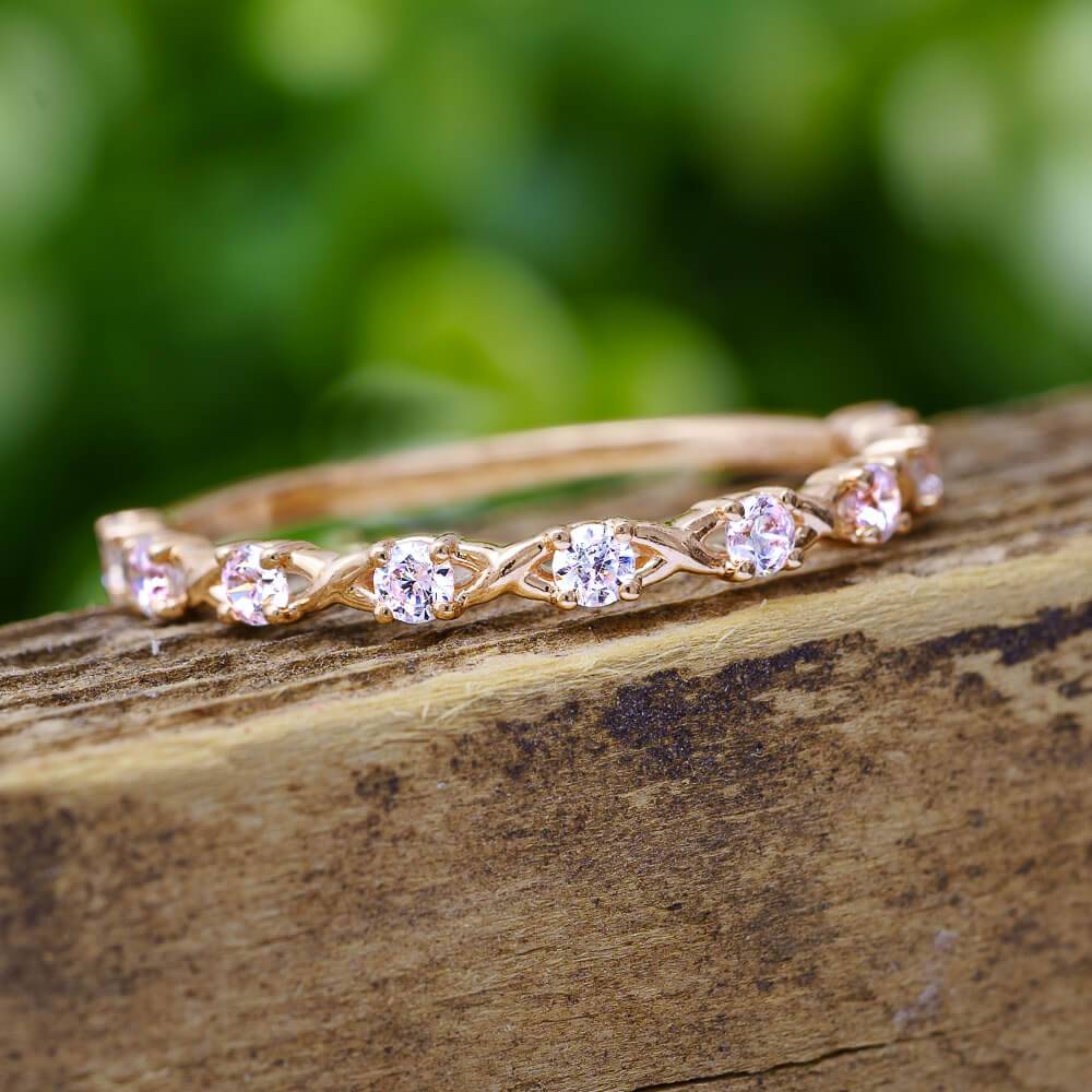 Rose gold diamond half eternity band with criss cross pattern
