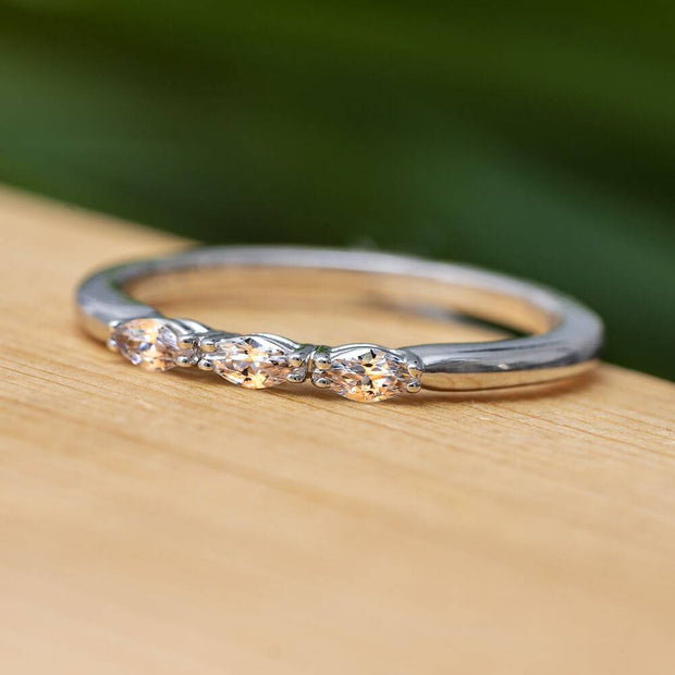3-stone marquise cut diamond stackable band on wood