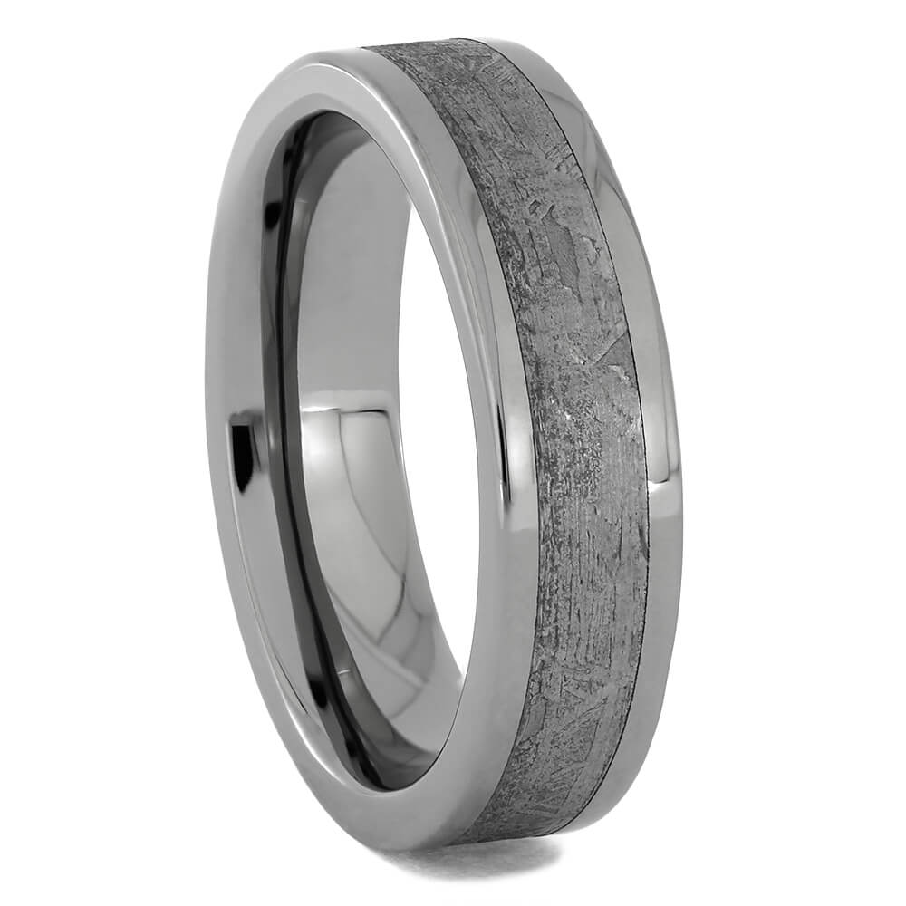 Genuine meteorite wedding band with polished titanium sleeve.