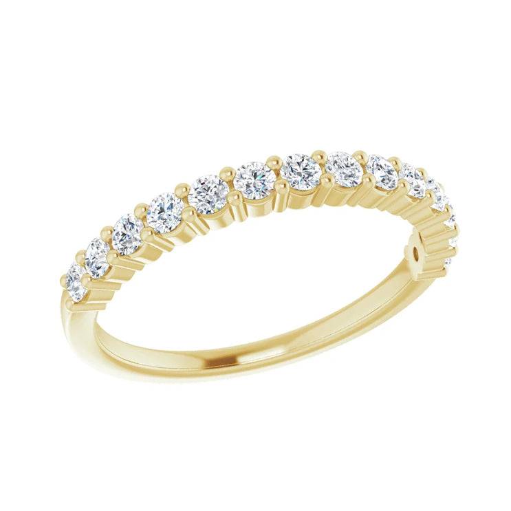 Half eternity diamond ring in yellow gold, side view