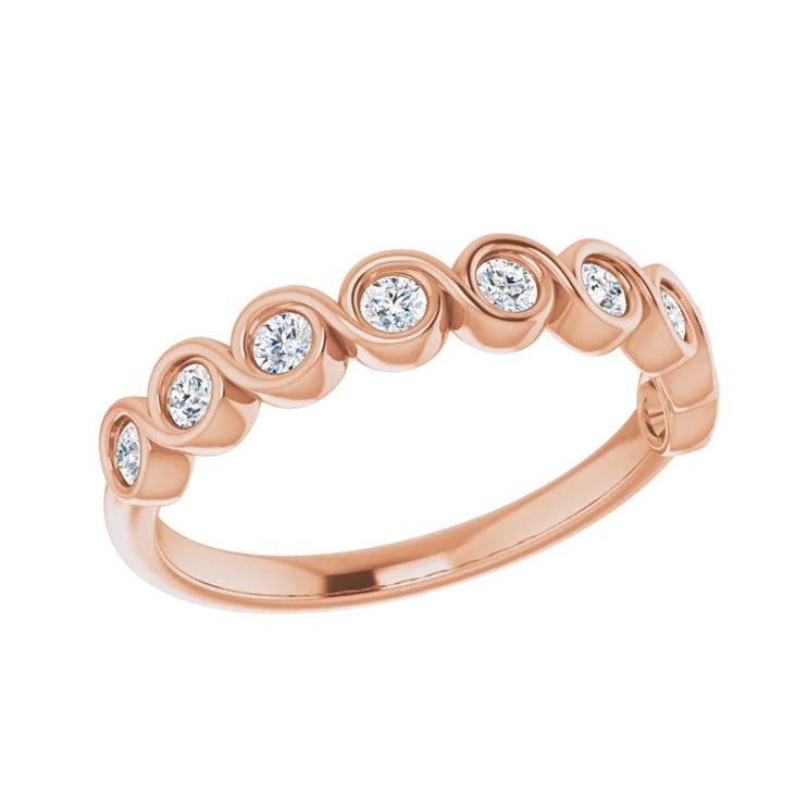 Rose gold diamond anniversary band with swirling bezel setting