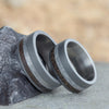 His And Hers Sandblasted Titanium Rings With Meteorite And Dinosaur Bone